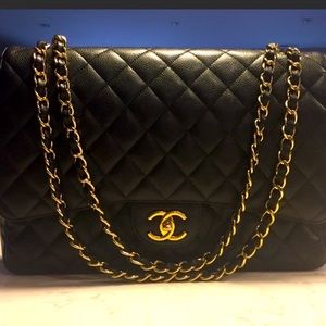 Chanel double flap maxi caviar.